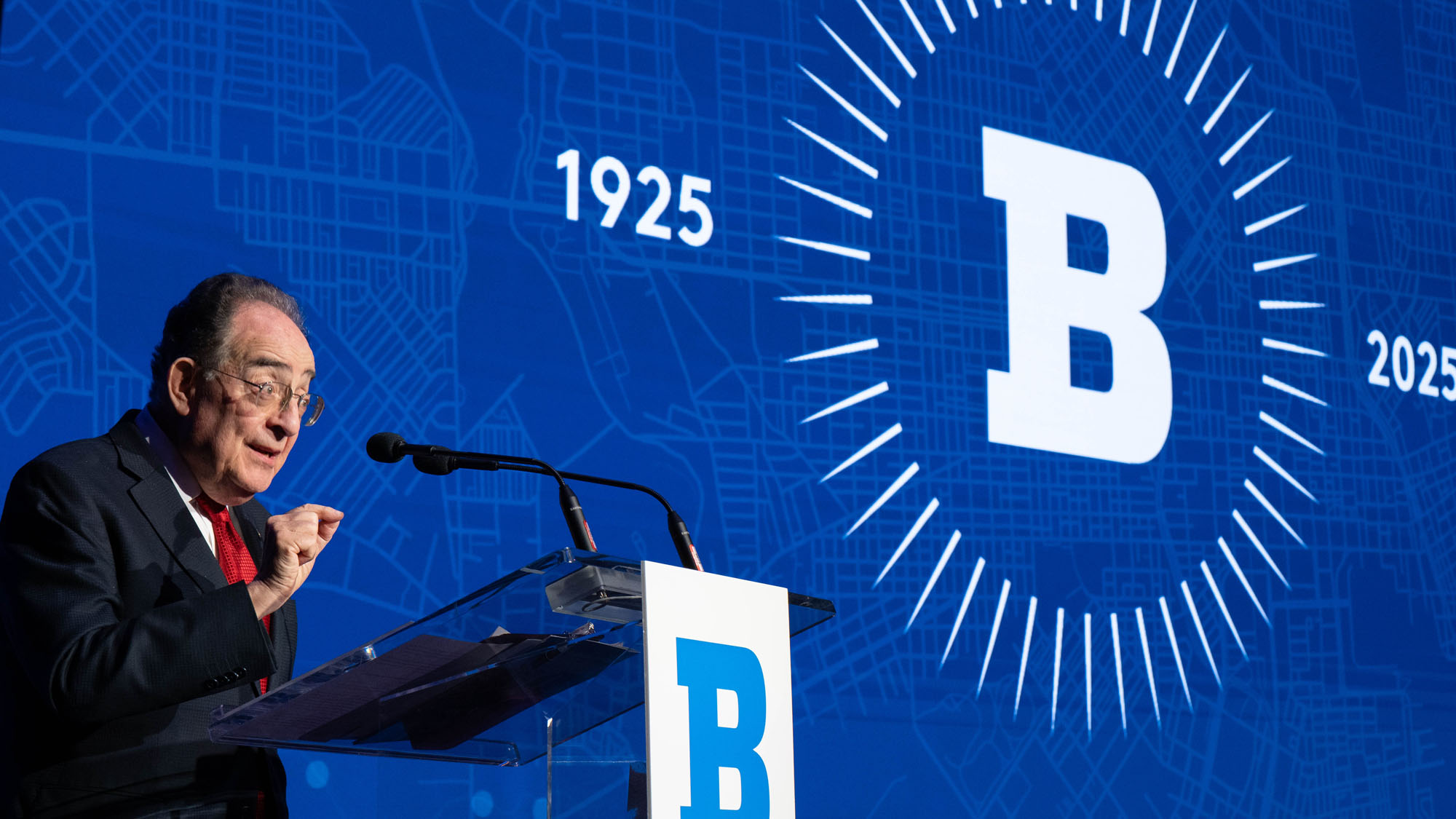 Jay Perman, chancellor for the University System of Maryland, speaks from the podium on stage.