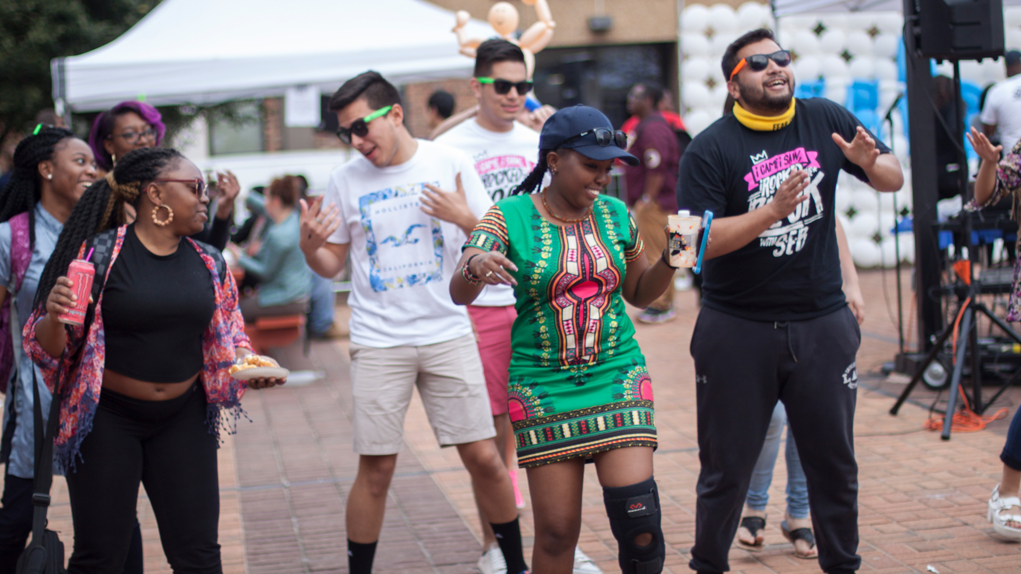 Students dance on Gordon Plaza. 