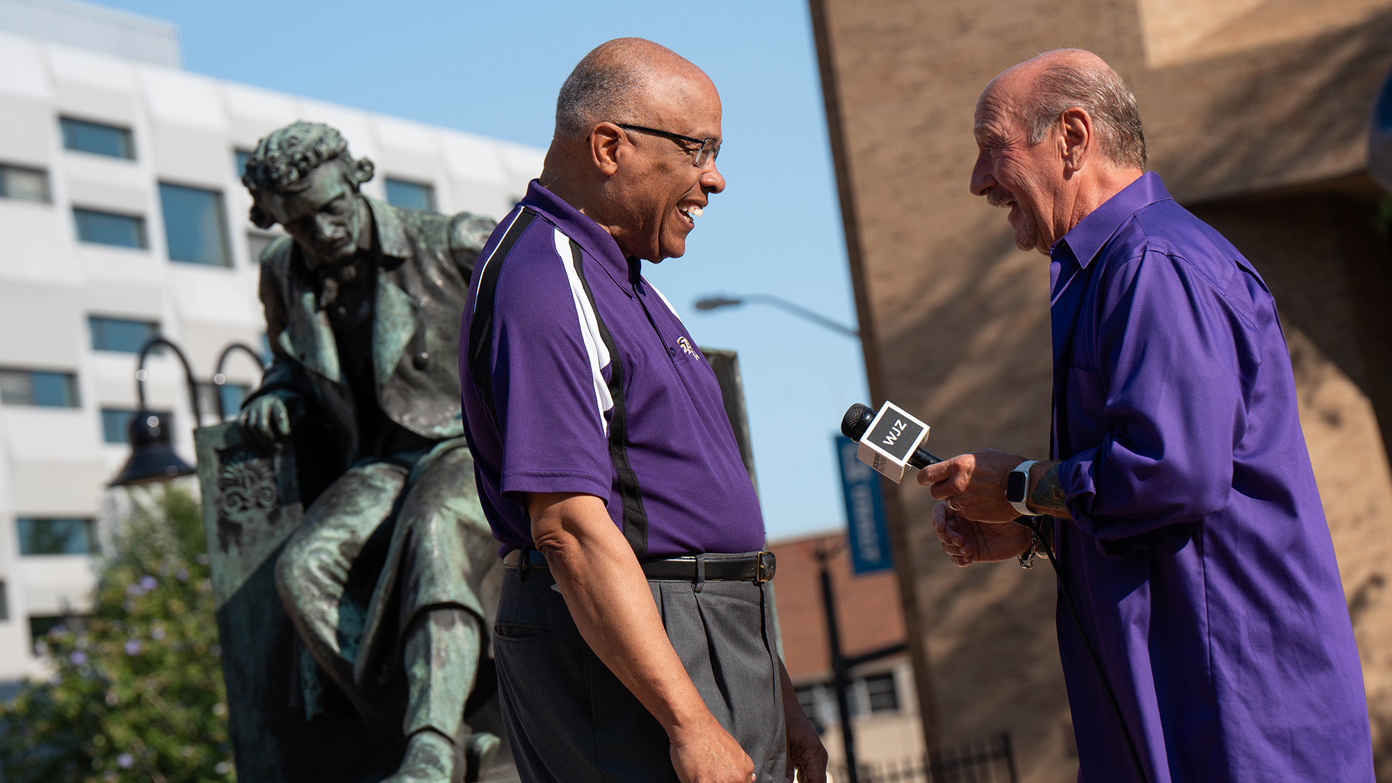 WJZ interviews Kurt Schmoke at the Poe statue. 